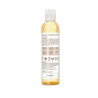 A 237ml bottle of Shea Moisture 100% Virgin Coconut Oil Daily Hydration Body Oil, featuring a lightweight, fast-absorbing formula infused with Virgin Coconut Oil and Coconut Milk. Designed for all skin types, this body oil provides everyday hydration, leaving the skin moisturized and glowing without a greasy residue.